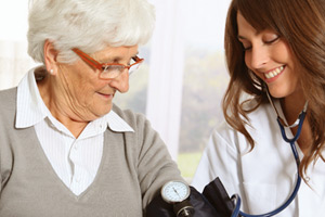 Elderly women with nurse