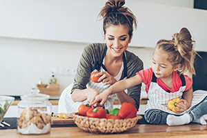 mom cooking with her daughter