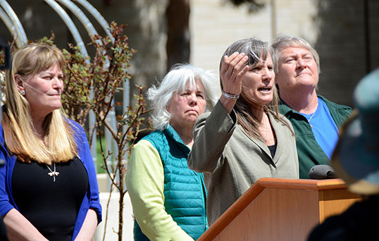 Commissioner Elise Jones speaks during a Rally for Climate Change Accountability