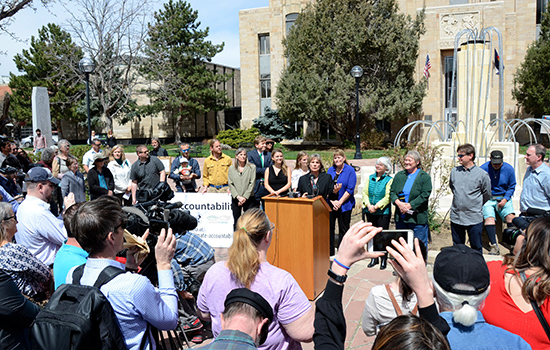 Suzanne Jones, Mayor, City of Boulder, standing at the podium addressing crowd