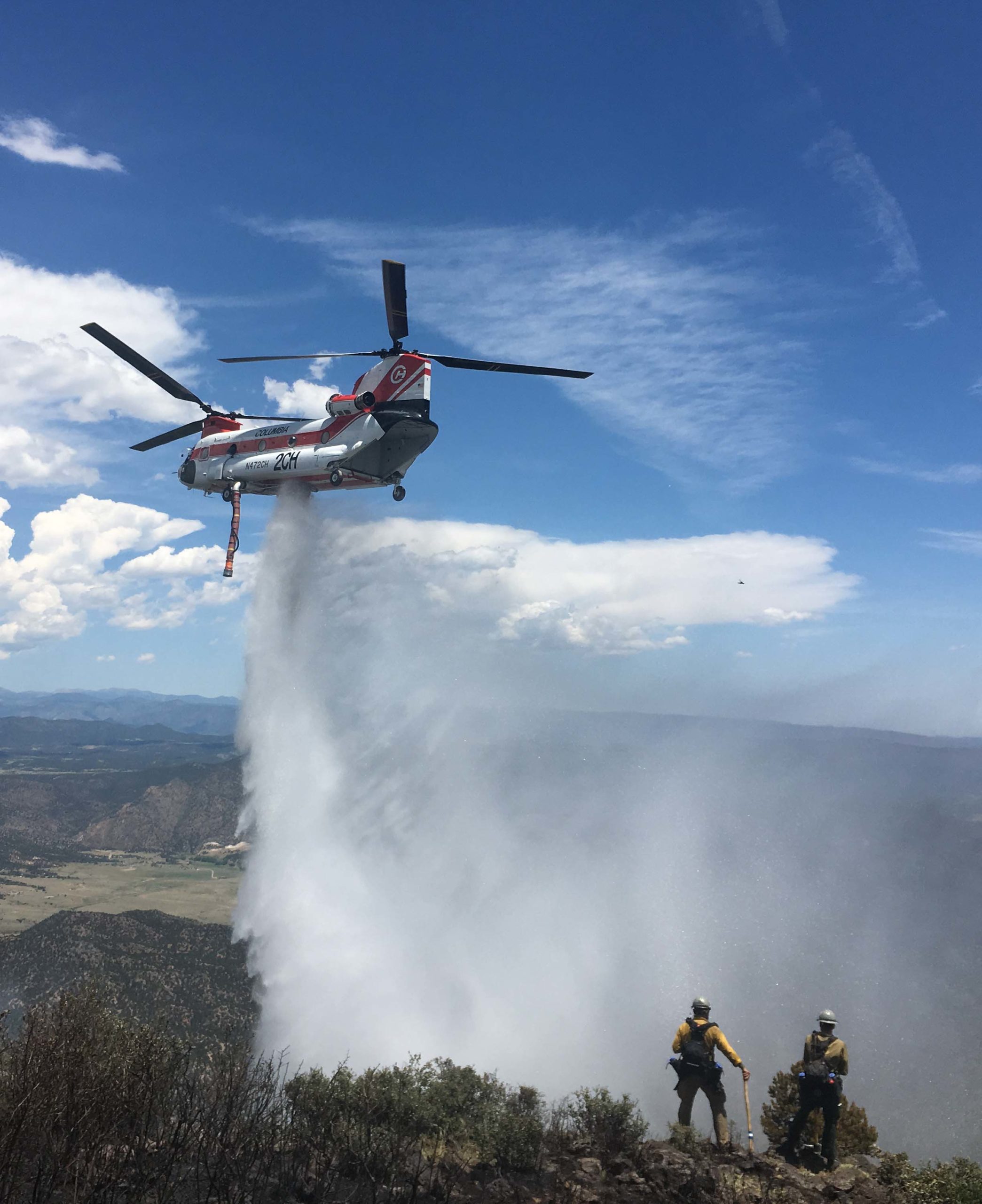 Helicopter water drop during Wildfire