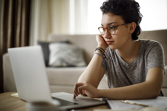 Young woman working at home