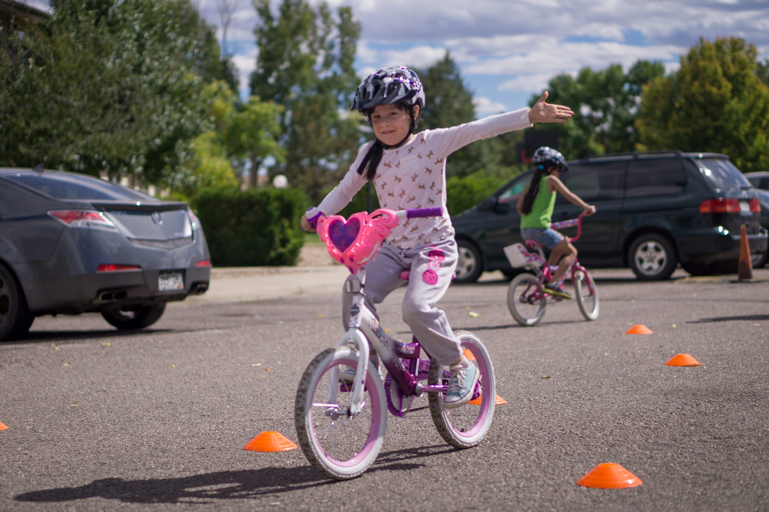 Young children participating in youth bike rodeo