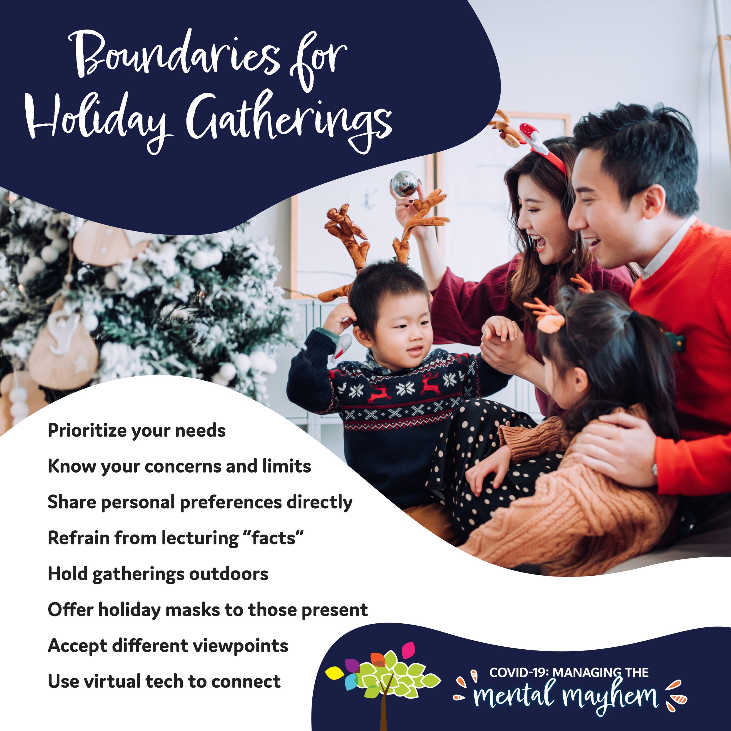 COVID-19 Mental Mayhem Blog: Boundaries for Holiday Gatherings - Asian family: mom and dad help young toddler put reindeer antlers on as daughter sits beside them with a Christmas tree beside them