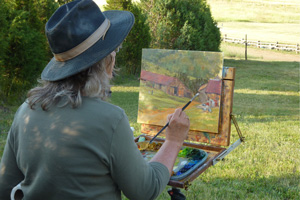 Painter on open space