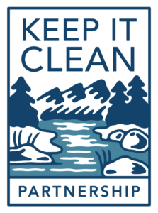 Logo for the Keep It Clean Partnership, which includes navy and blue illustrated imagery of a mountain watershed.