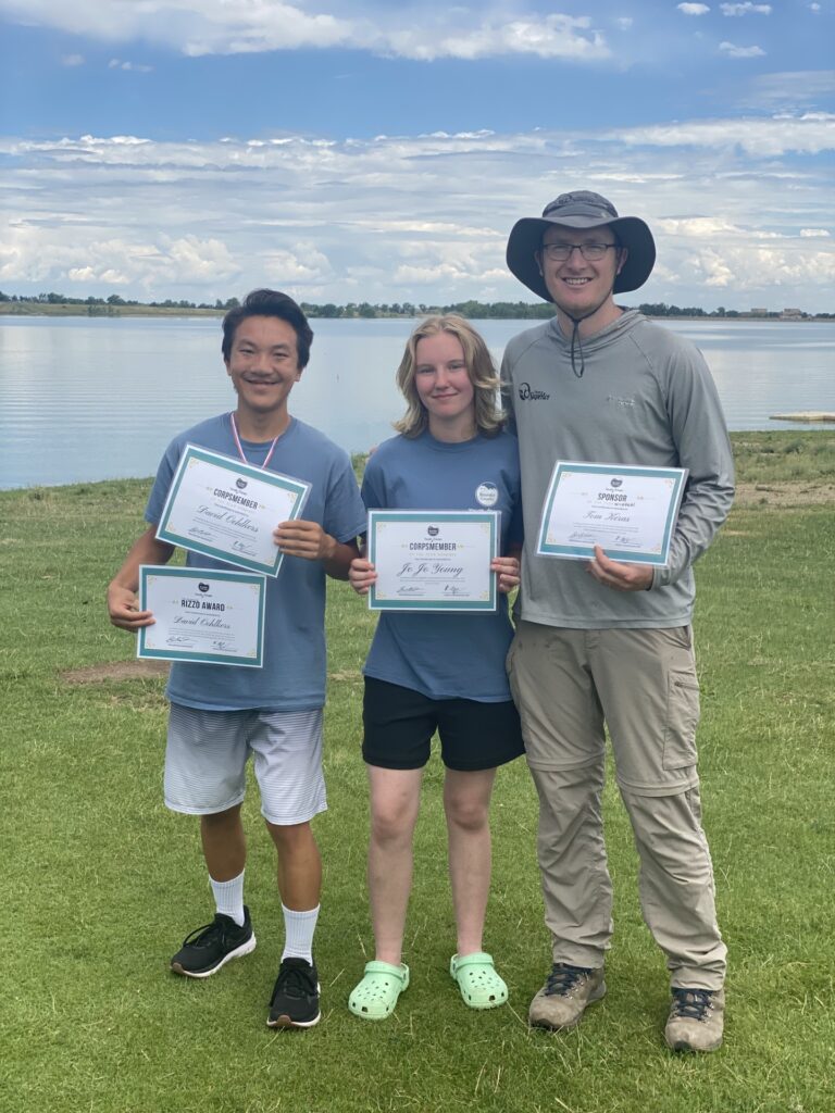 David Oehlkers, JoJo Young, and Tom Keras holding their award certificates
