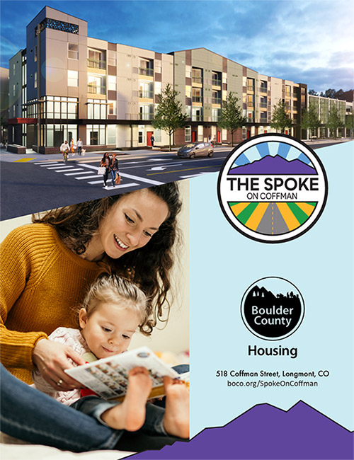 People crossing street, building, and child reading with parent.