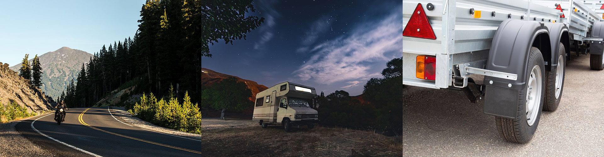 A person rides a motorcycle in mountains, an RV is parked under the stars, and trailers are parked in a lot
