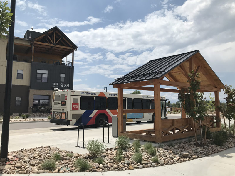New RTD bus shelter with a modern design in a newly developed neighborhood.