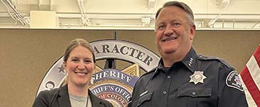 Sheriff Curtis 'CJ' Johnson with a member of the Records Division