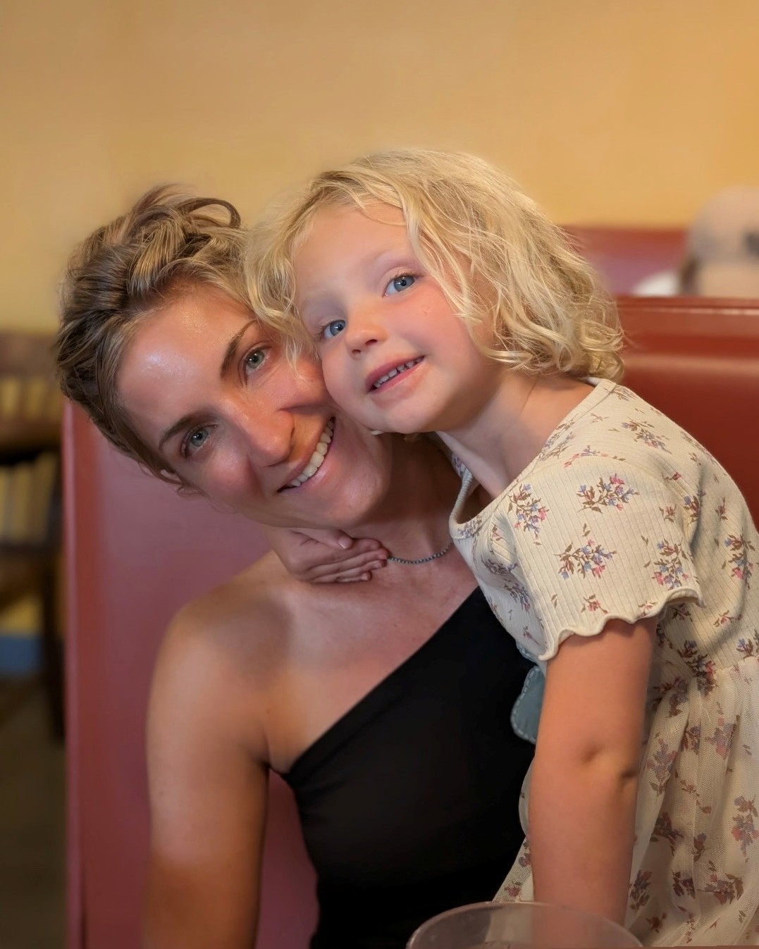 Photo of Kelly Veit with her daughter