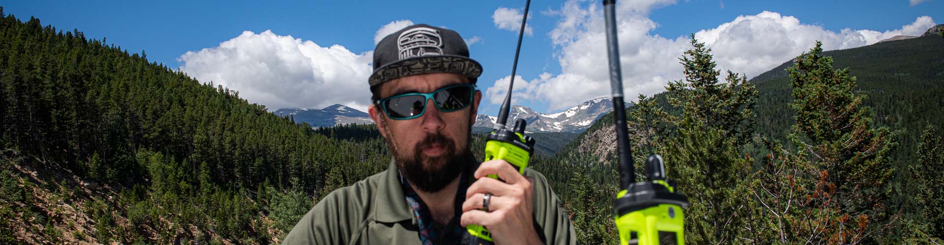 A Member of Support Services transmitting over a radio