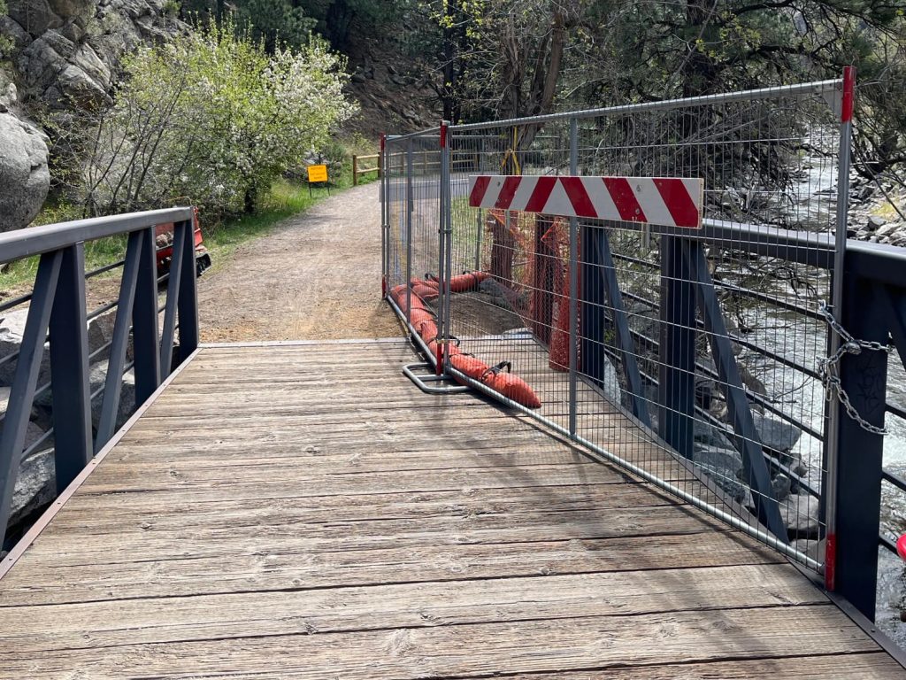 Fencing along the bridge reduces the width of the trail.