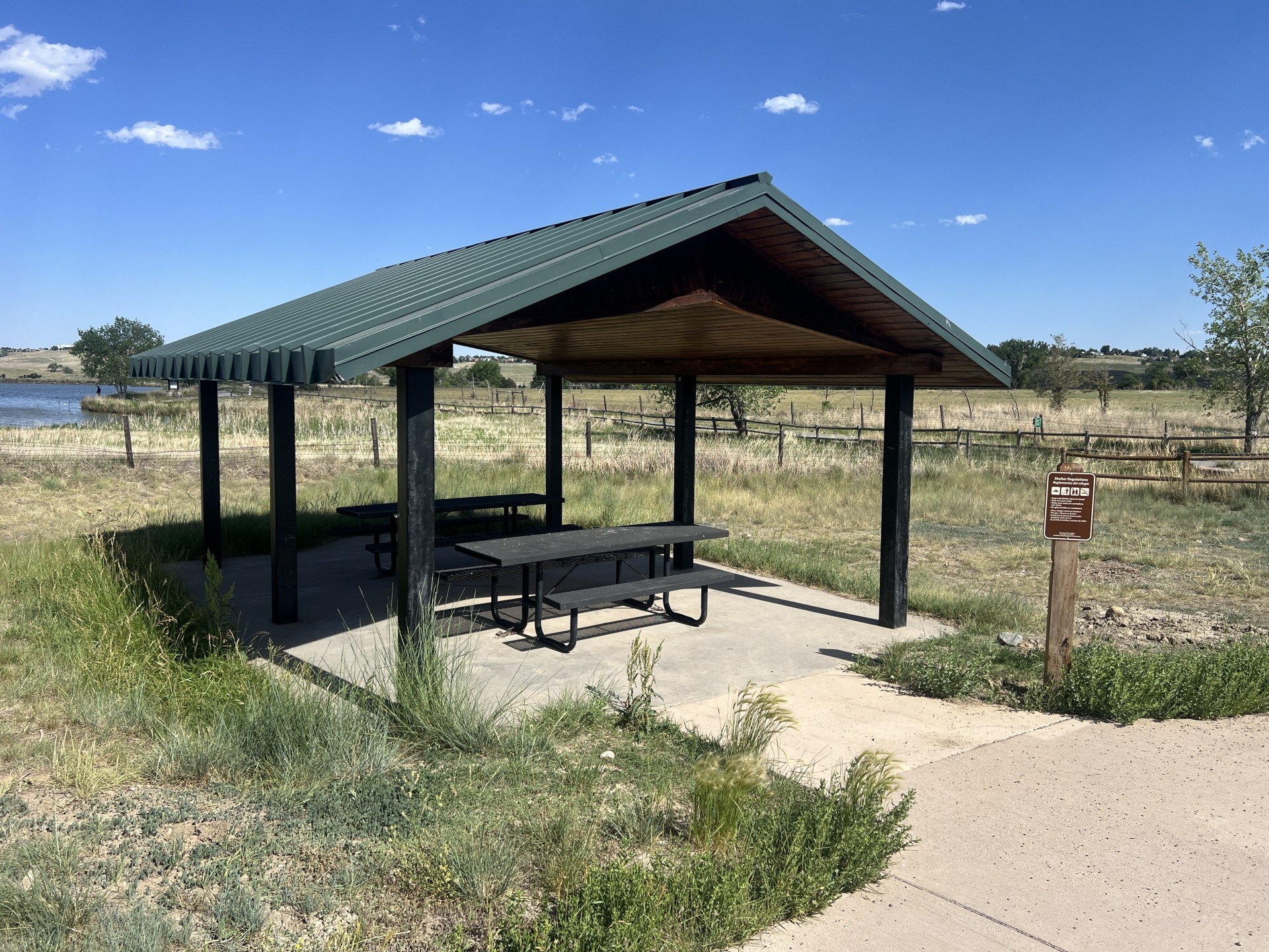 Carolyn Holmberg Preserve / Stearns Lake Shelter with two picnic tables.