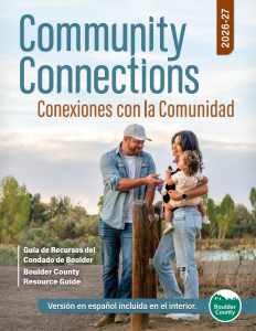 Cover of Community Connections magazine. Family on a trail by a pond with trees in the background.