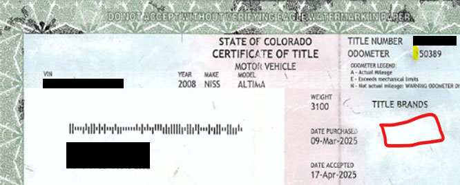 Example of an altered title where the title brand and first number of the odometer has been erased.