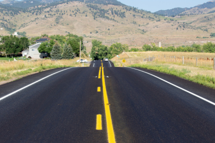 Road that has been recently chip sealed.