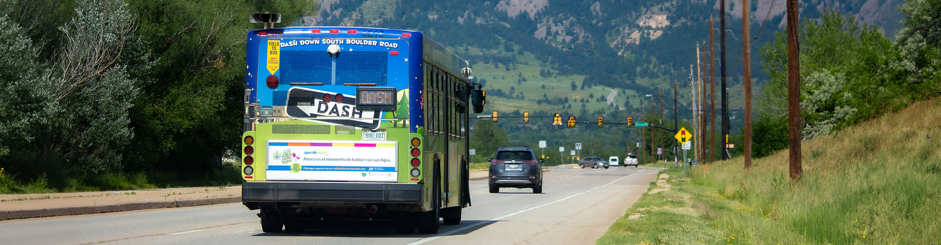A DASH bus travels on South Boulder Road.