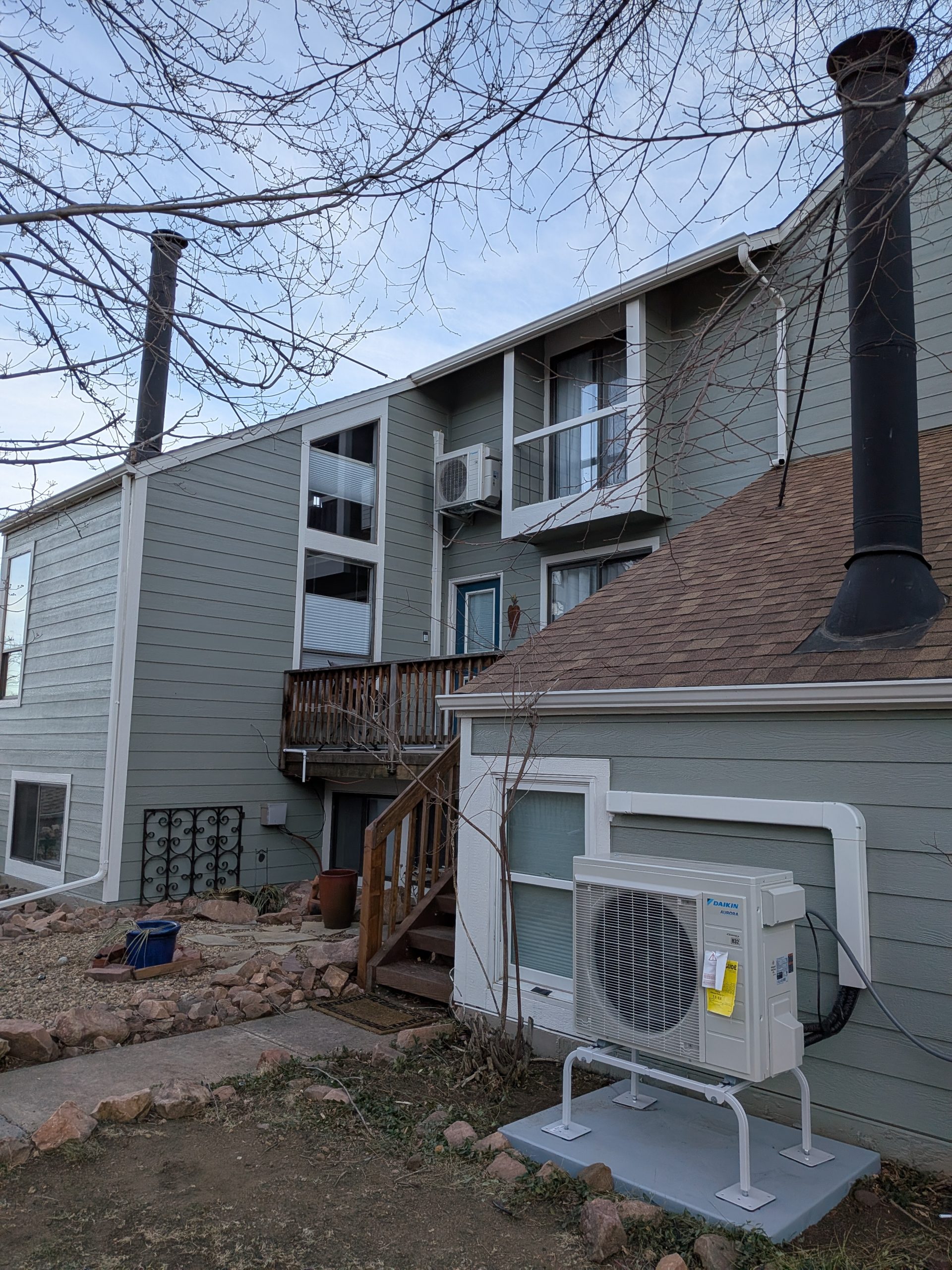 Two heat pump installations, one upstairs and one downstairs, at an HOA property in Boulder